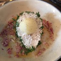 Avocado with fresh citrus sauce and potato scoop at Los Loosers in Mexico City