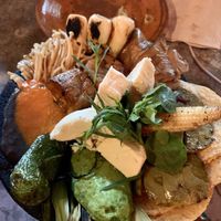Molcajete con nopal, cebollitas, hongos, tortillitas at Los Loosers in Mexico City