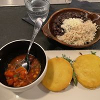 Arepitas with a side of arroz y frijoles 😋  at Sentir in New York City
