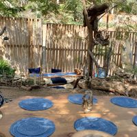 Outdoor seating at Sambodhi Garden in Mazunte