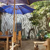 Outdoor seating at Sambodhi Garden in Mazunte