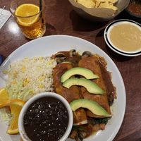 Vegan queso and spinach/mushroom enchiladas   at Fresa in Everett