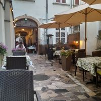 Outside area to eat at Piwnica pod Kominkiem in Krakow