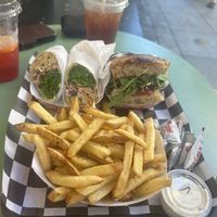 Chikn Caesar wrap, fries and high road sando with house-made focaccia, all vegan and all delicious with an ice tea and a hibiscus Arnold Palmer   at Pretty Good Advice - Santa Cruz in Santa Cruz