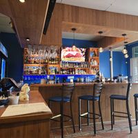 A small bar as well as a comfortable dining area. at The Rice House Bistro in Ocean City