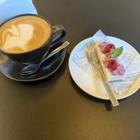 Oat latte and raspberry cheesecake   at Sativo  in Puerto Varas