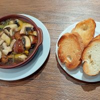 Mushroom ajillo with toasted baguette at Vegan Eat Tokyo in Tokyo