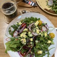 Iced coffee latte with almond milk & salad  at Garden Balthazar Caffe - Picoas in Lisbon