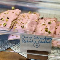 Cherry Strawberry Pistachio Ghost tarts in the case  at DOUGH  in Dayton