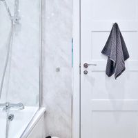 Bathroom - with a shower bath. The bathroom is stocked with towels, bamboo toilet roll and refillable bathroom soap at Selbrooke House in Bristol