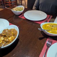 Mango curry, kadai/jalfrezi, coconut cream masala, some with tofu and some with veggies, yummy!! at India's Grill Brandon in Brandon
