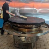 Dinner being cooked at Gobi Mongolian BBQ in Santa Cruz