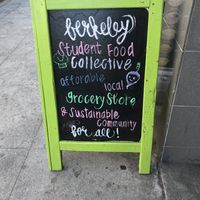 Welcoming sign by the door  at Berkeley Student Food Collective in Berkeley