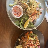 Tempeh pad thai and crispy chicken and ricee  at Khu Khu CBD in Auckland