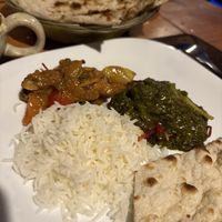 Aloo palak and mushroon curry with plain naan and basmati  at Namaste Indian Restaurant in Manuel Antonio