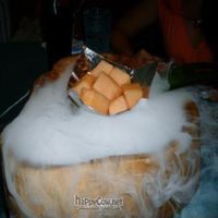 Melon atop dry ice at Pure Lotus - Jìng Xīn Lián 净心莲 in Beijing