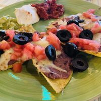 Tacos (we ordered with no ham). Optional to order with no cheese - add avocado and cashews for VEGAN option .  at Mamacita's  in Borovets