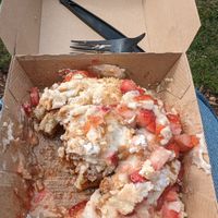 Strawberry cheesecake type of toppings  at Cinnaholic - South Loop in Chicago