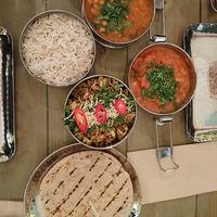 Bel puri, tea infused chickpeas, potato curry, basmati rice, chapatis at Mowgli in Chelmsford