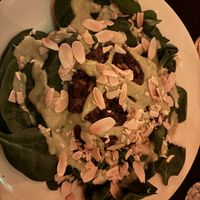  Vegan version of signature bean cake. Very tasty but personally wasn’t a huge fan of the uncooked spinach.   at Cold Mountain Cafe in Bethlehem