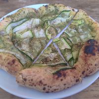 Vegan pizza with zucchini and herbs at Al Tempo  in San Pedro La Laguna