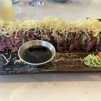 Crispy Chickn roll - purple rice; avocado; something on top. Filling; tasty; not life-altering    at Origami - Napier in Napier