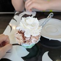 Coppetta con cookies, variegato Nutella e nocciola con panna veg at Supergiù Gelateria Bar in Rome