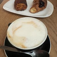 Vegan cappuccino and vegan croissant and lampone  at Teraferma in Venice