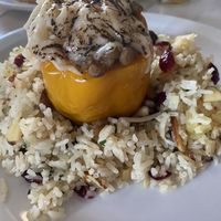 Lentil stuffed pepper on almond cranberry pilaf with vegan cheesee they could  at St Germain Bistro and Cafe in San Juan