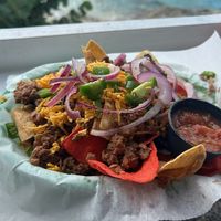 Classic nachos with vegan cheese and crumble. Jalapeños and onions were and extra $.50 each     at Louie & Nacho's Beach Bar in St Croix
