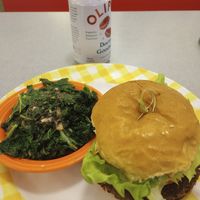 Lentil burger and sauteed kale as a side at Sealevel City Vegan Diner in Wilmington
