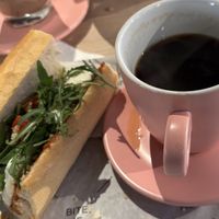 Veggie sandwich with an Americano. So good, I ate and drank half of my lunch before taking this photo!  at Tasty Bruges in Bruges