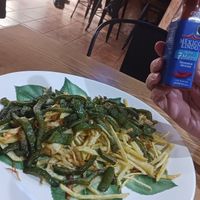 Fried potatoes,  peppers and hot sauce! 💚 at EL CAÑIZO de Carmen in Albacete