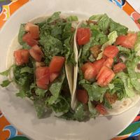 Tofu a la Mexicana soft flour tacos!
Tofu sautéed with tomatoes, garlic, onions, and jalapeños. Topped with lettuce and tomatoes    at Carrburritos in Chapel Hill