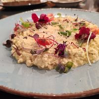 Scrambled tofu comes with a basket of bread, very filling itself already at Al Ponte Prague in Prague