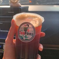 Té rojo con melocotón y perlas de tapioca. Estaba refrescante, un poco dulce    at Tea Fans in Santiago De Los Caballeros