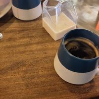 Coffee with oat milk (coffee was very good) at Hustle in Belfast