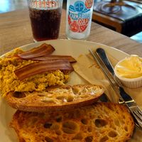 Scrambled tofu toast with bacon at Hustle in Belfast