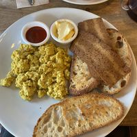 Scrambled tofu toast and bacon   at Hustle in Belfast