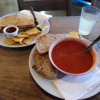 From top left: chicken sandwich and tomato basil soup at Hustle in Belfast