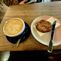Oat latte, biscoff cookie at Hustle in Belfast