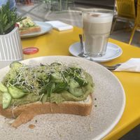 Avocado toast and oat chai lattee  at Brenner in Vienna