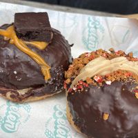 Chocolate orange fudge and chocolate biscoff donuts   at Belén Vegan Bakery in Wellington