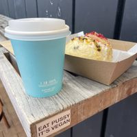 Coffee and passion fruit cheesecake doughnut.  at Belén Vegan Bakery in Wellington
