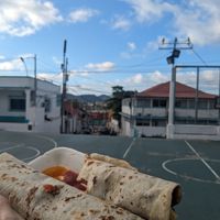 Burritos at Tacos Los Peches in Flores
