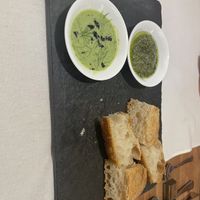 Homemade bread with herb emulsions   at Tierra Restaurante  in Sucre