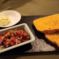 fresh bread with butter and salsa starter at Tierra Restaurante  in Sucre