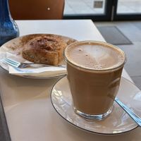 Cappuccino and cinnamon roll  at Metta in Munich