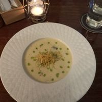 ERDÄPFELCREMESUPPERL
sautierte Kräuterseitlinge / grünes Öl / Erdäpfelstroh  at Schlawiener Wirtshaus  in Vienna