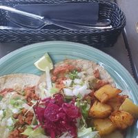 Three tacos for 12,50€. Tiny amount of potatoes as a side and no dips at all. at Alebrijes in Frankfurt